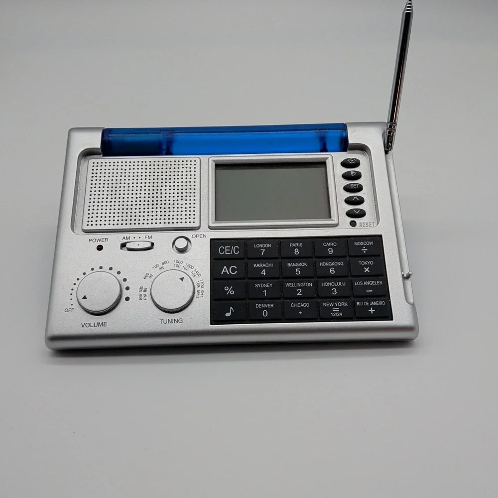 Ultronic WS-9 World Traveler Portable Flip Up Alarm Clock Radio Calculator